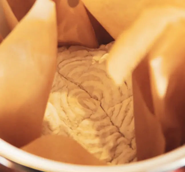 Sourdough just before oven with banneton stripes