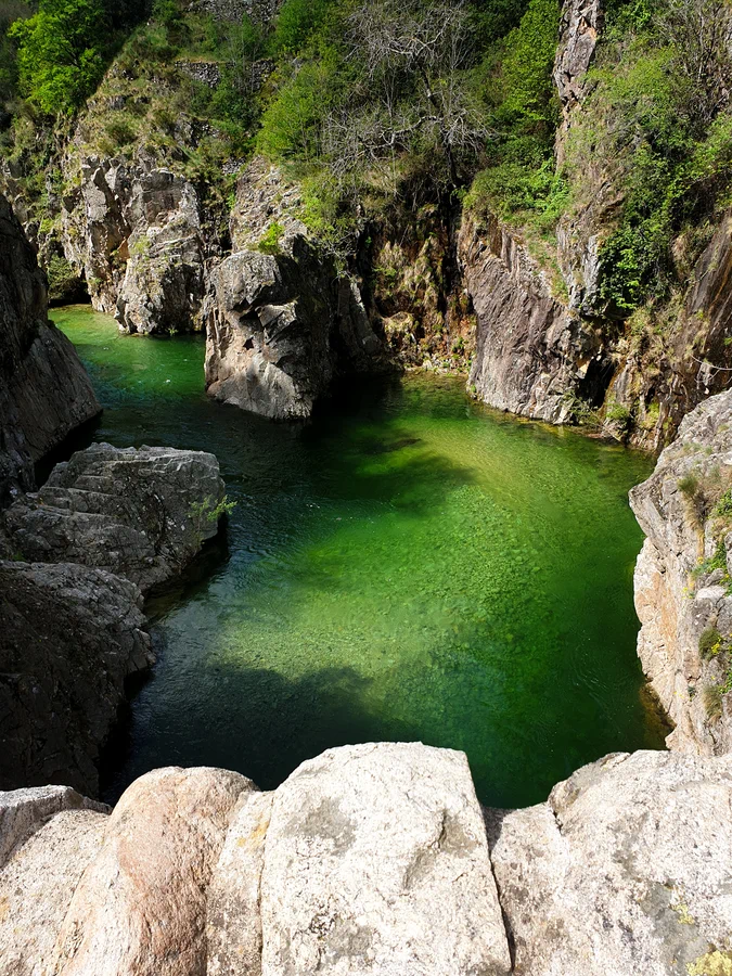 Deep river pools beneath the Pont de Diable